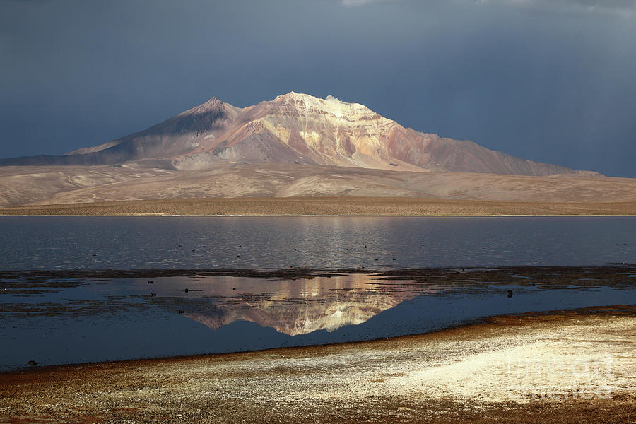 Quisi Quisini volcano and Lake Chungara on a Stormy Afternoon Chile Photograph by James Brunker