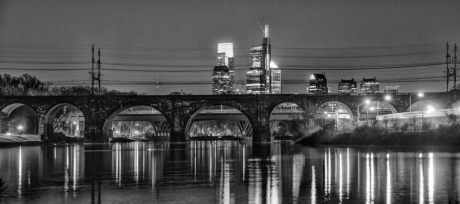 Railroad Bridge and Philadelphia Cityscape at Night in Black and Photograph by Bill Cannon