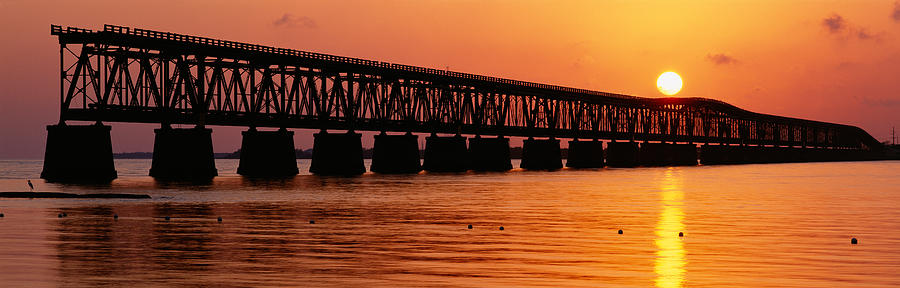 Sunset Photograph - Railroad Bridge At Sunset, Florida by Panoramic Images