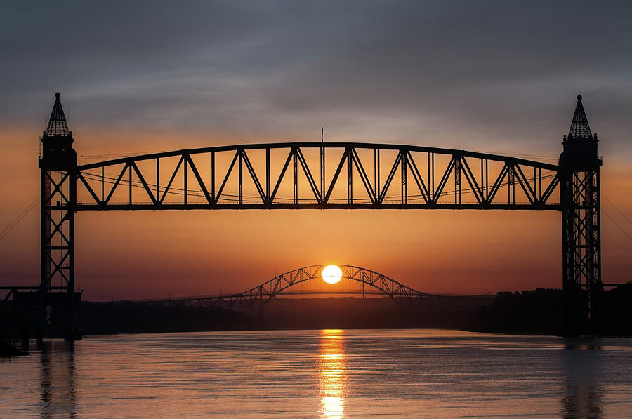 Railroad Bridge framing the Bourne Bridge during a sunrise by Ed Cabral Railroad Bridge framing the Bourne Bridge during a sunrise by Ed Cabral
