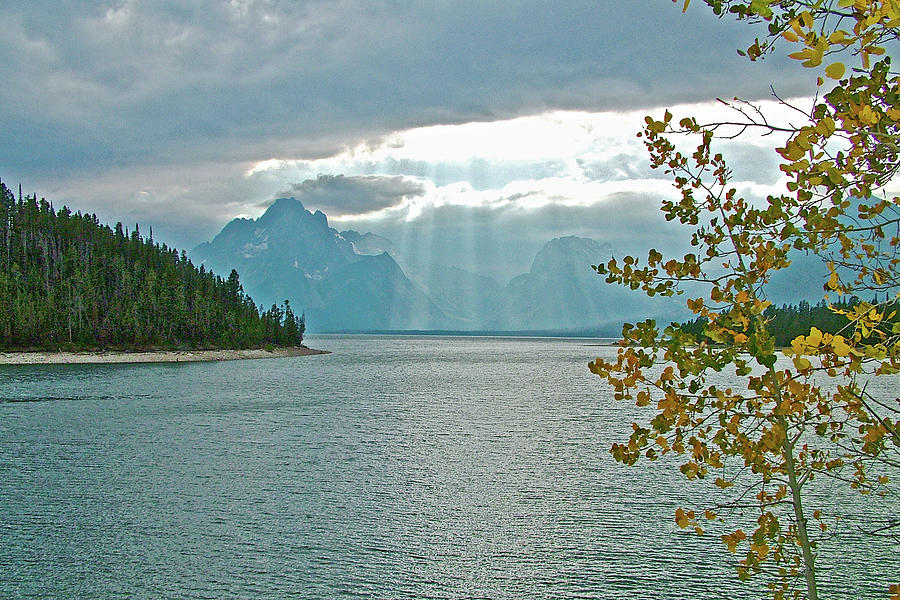 Rain and Sun on Jackson Lake in Grand Tetons National Park, Wyoming  Photograph by Ruth Hager