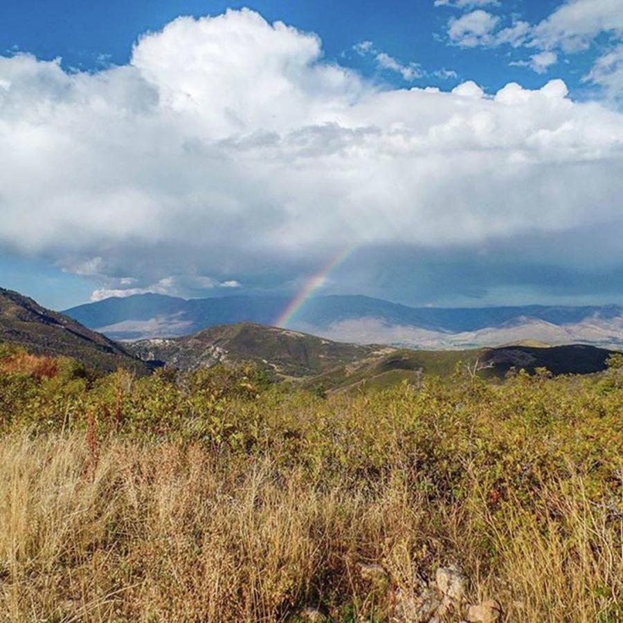 Mountain Photograph - #rain #rainbow #clouds #mountain by Melissa Helmbrecht