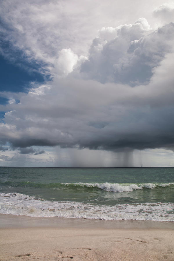 Rain storm over the Atlantic ocean Photograph by Zina Stromberg