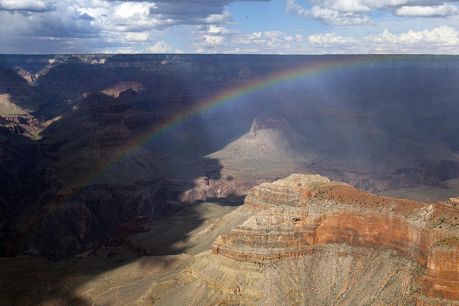 Rainbow Arcs Over the Grand Canyon Photograph by Rick Pisio