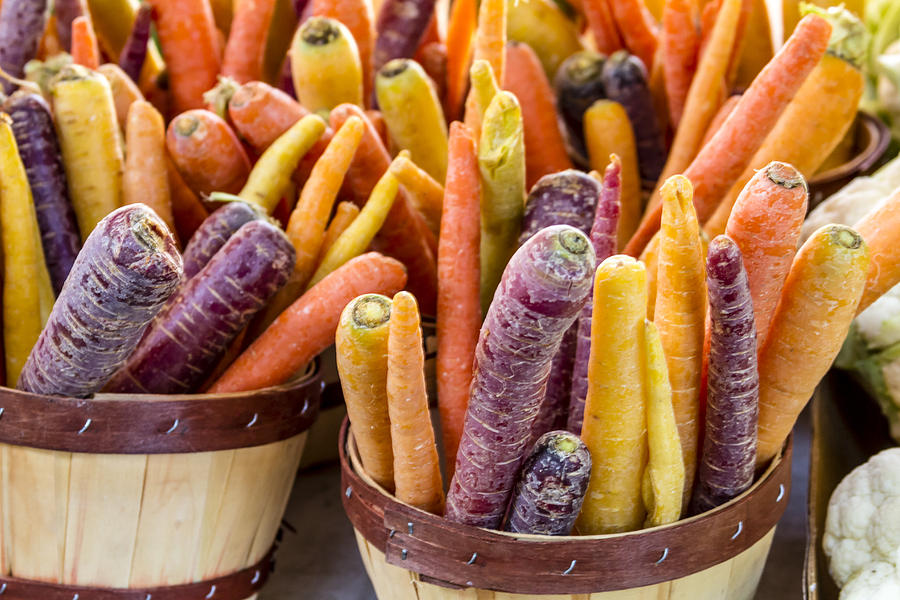 Rainbow Carrots at the Market Photograph by Teri Virbickis