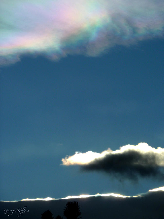 Rainbow cloud Photograph by George Tuffy