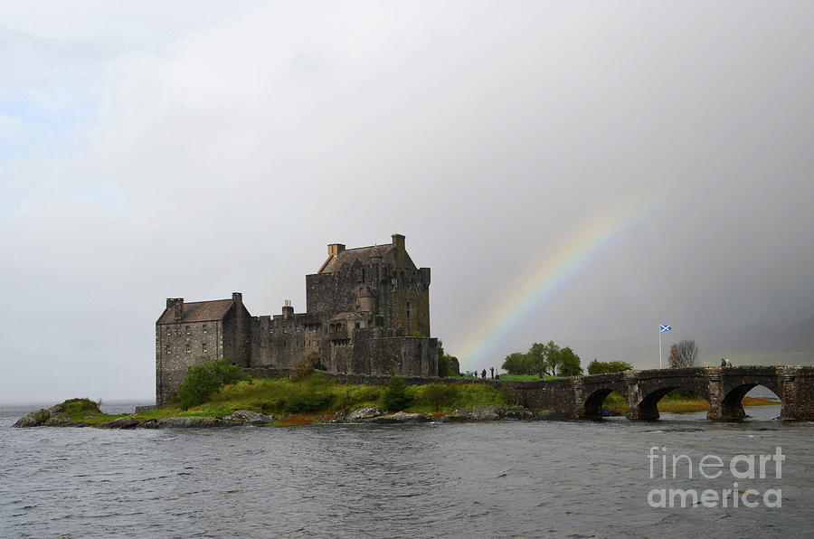 Castle Photograph - Rainbow Coming from the Base of Eilean Donan by DejaVu Designs