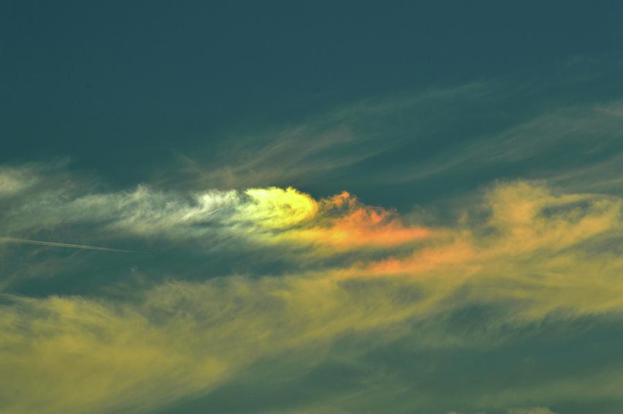 Rainbow In A Cloud  Photograph by Lyle Crump