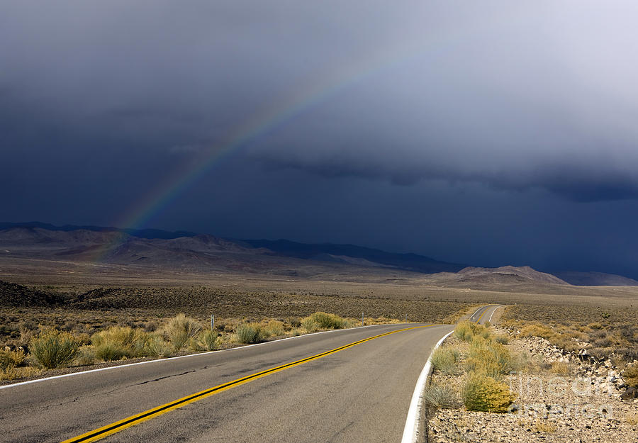 Rainbow in Death Valley National Park Photograph by Jason O Watson