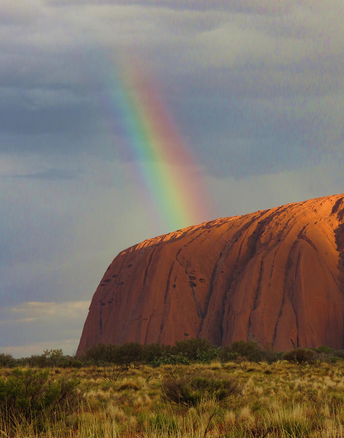 Rainbow on Uluru Photograph by Helaine Cummins