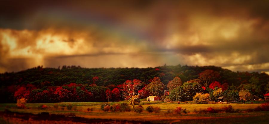 Rainbow over countryside Photograph by Lilia S