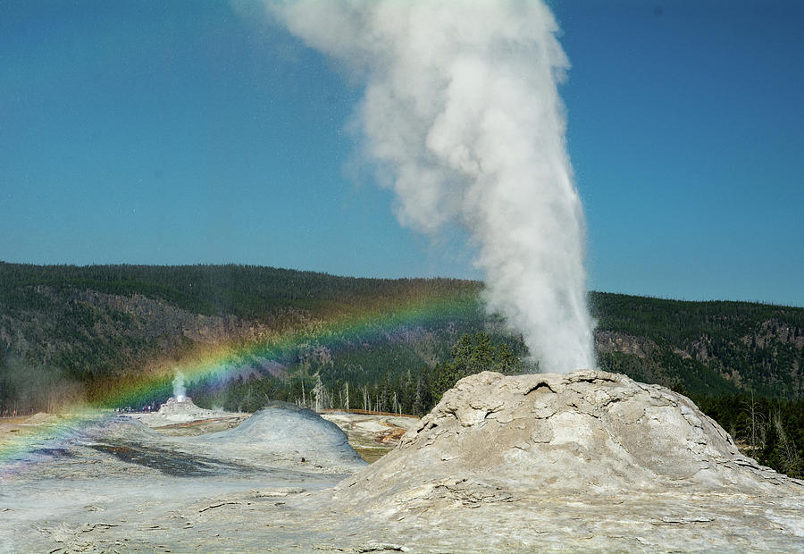 Rainbow over Lion Geyser Photograph by Janis Connell