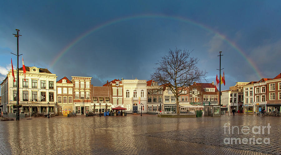 Rainbow over market place Gouda Photograph by Casper Cammeraat