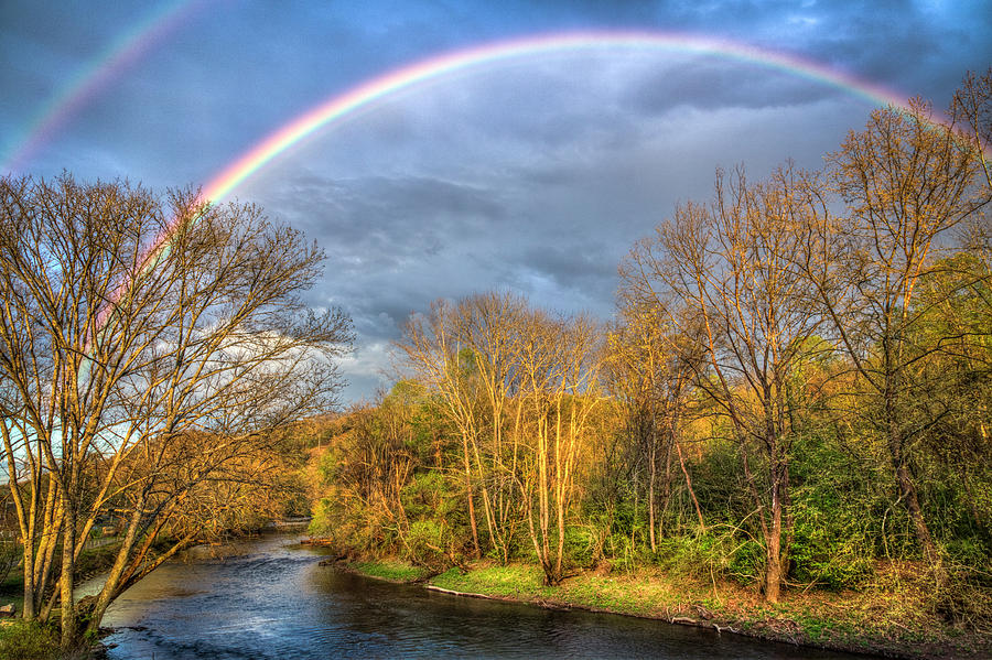 Rainbow Over the River Photograph by Debra and Dave Vanderlaan