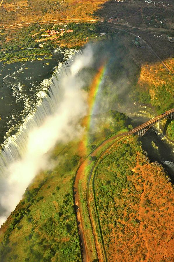 Rainbow over Victoria Falls Photograph by Don Mercer