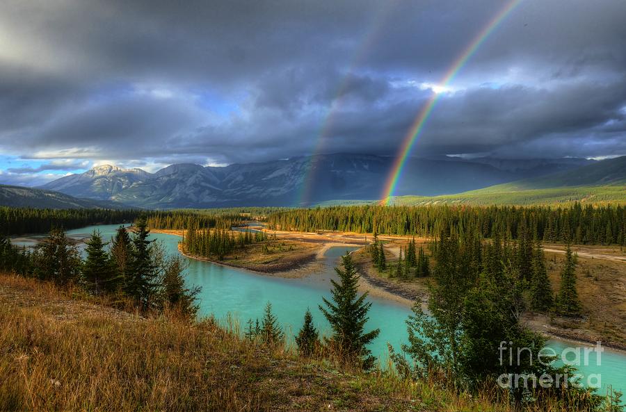 Rainbows on the Athabasca River Jasper National Park Photograph by Wayne Moran