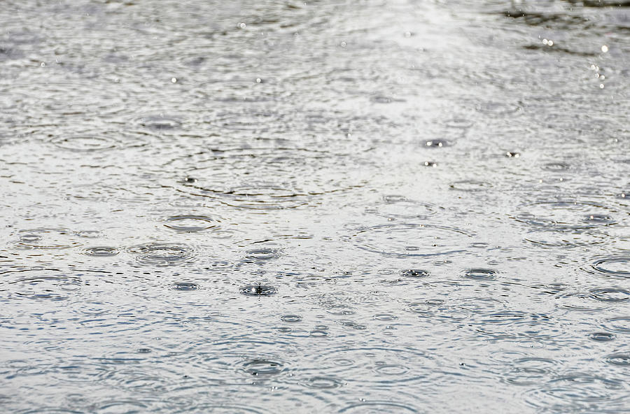 Raindrops on the water surface Photograph by Dutourdumonde Photography ...