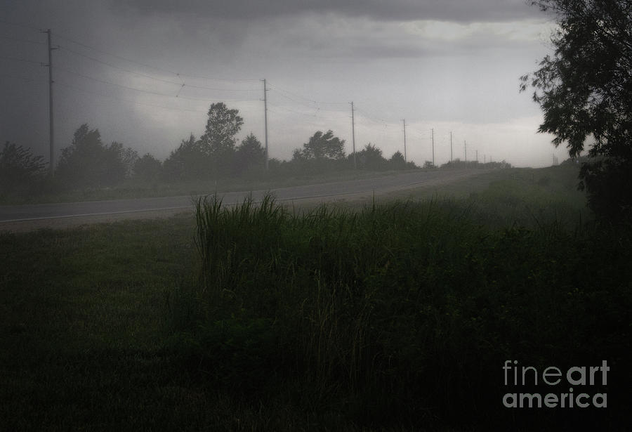 Rains Coming Photograph by Fred Lassmann