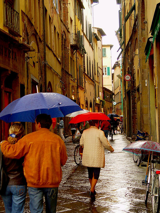 Rainy day Shopping in Italy Photograph by Nancy Bradley