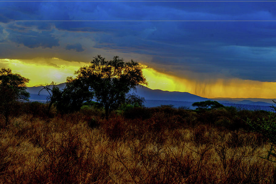 Rainy Sunset in Tanzania Photograph by Marilyn Burton
