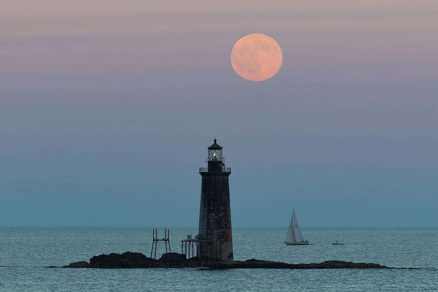 Ram Island Light Buck Moon and Sailboat Photograph by Colin Chase