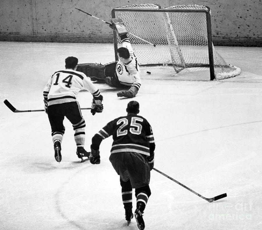 Rangers' Orland Kurtenbach scores a goal on Bruins Ed Johnston. 1966  Photograph by William Jacobellis - Pixels