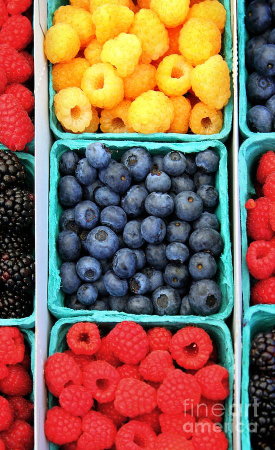Raspberries and Blueberries Photograph by Henrik Lehnerer