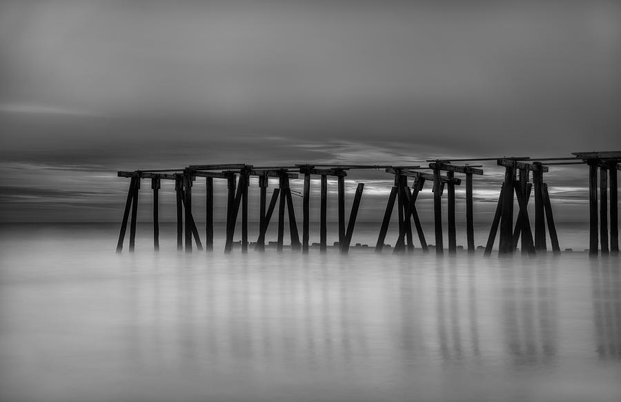 Pier Photograph - Raven Pier by John Maslowski