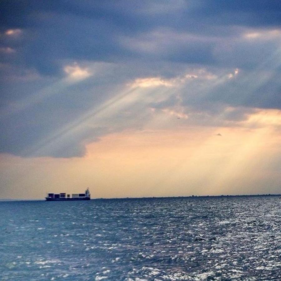 Transportation Photograph - Rays Of Light And A Ship by Emmanuel Varnas