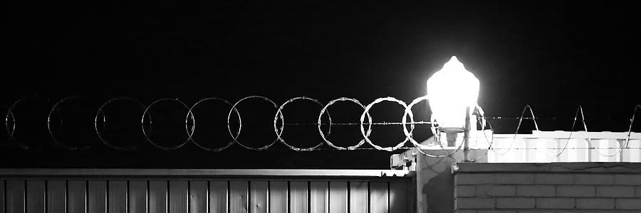 Razor Wire Fence Photograph by Viktor Savchenko