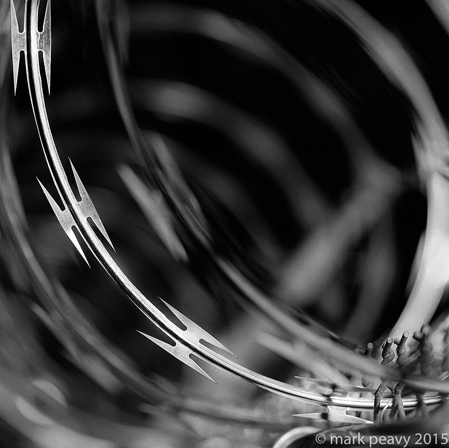 Razor Wire Up Close Photograph by Mark Peavy