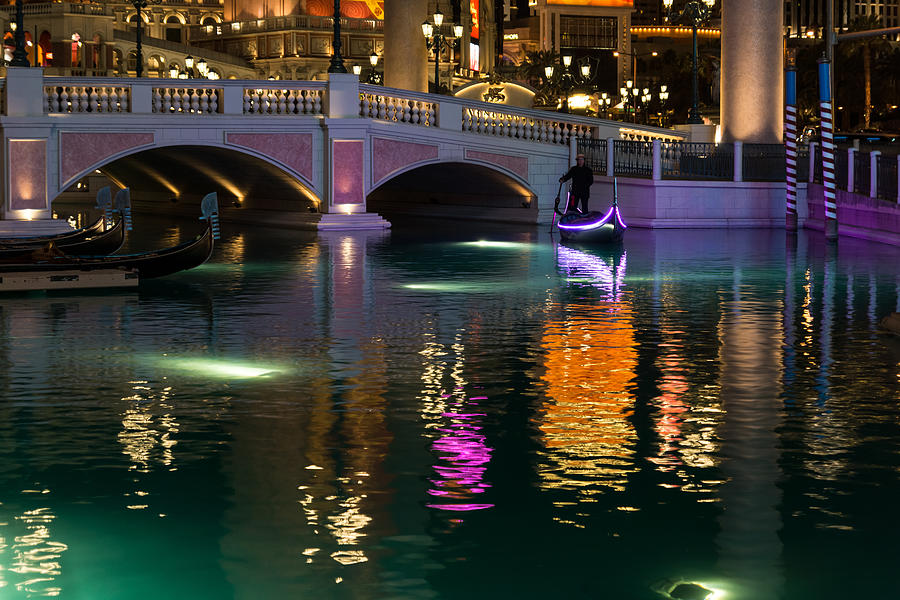 Razzle Dazzle - Colorful Neon Lights Up Canals and Gondolas at the Venetian Las Vegas Photograph by Georgia Mizuleva