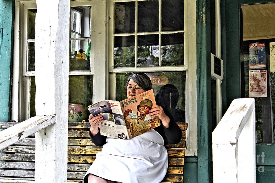 Reading the Saturday Evening Post Photograph by Jimmy Ostgard