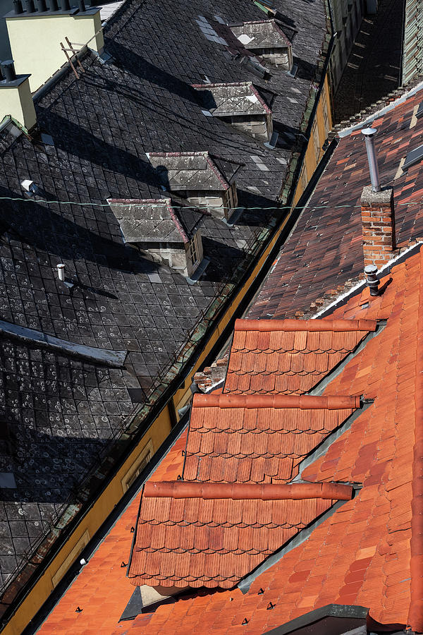 Red And Black Tile House Roof Photograph by Artur Bogacki