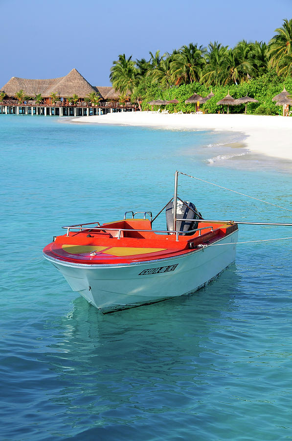 Red and Blue. Boat in Ocean Lagoon Photograph by Jenny Rainbow