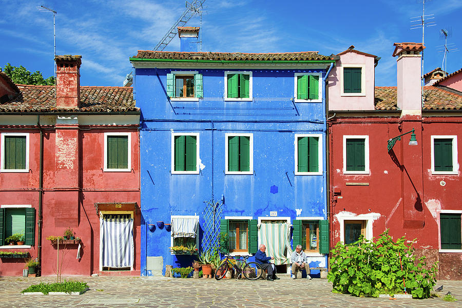 Red and blue houses in Burano Venice Italy Photograph by Matthias Hauser