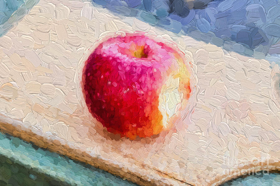 Red apple on wooden cutting board Photograph by Les Palenik