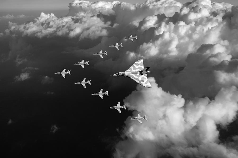 Red Arrows and Vulcan above clouds black and white Photograph by Gary Eason