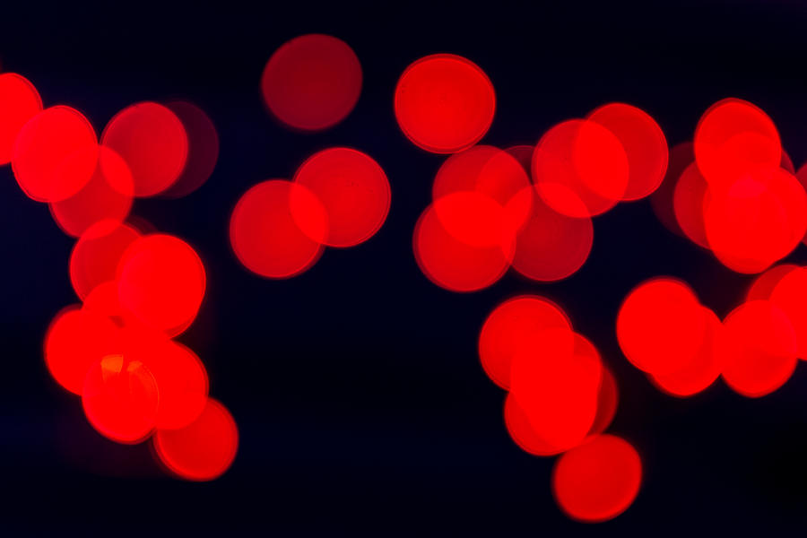 Red Blurred Celebration Fairy Lights Photograph by John Williams