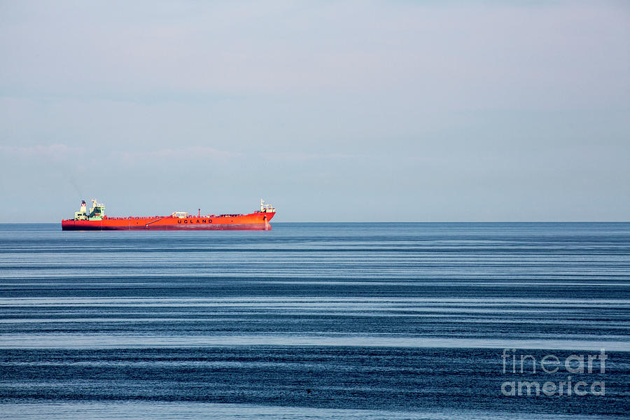 Red boat in calm Baltic Sea Photograph by Sheila Smart Fine Art Photography