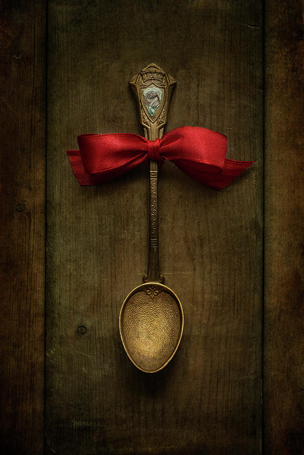 Red bow and ornamented spoon Photograph by Jaroslaw Blaminsky