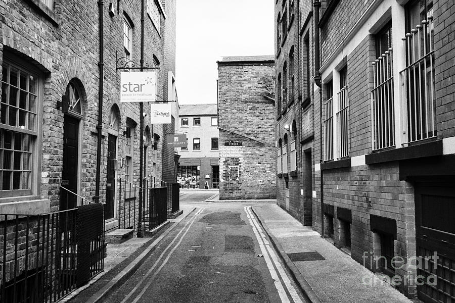 Brick Photograph - red brick buildings in narrow back turner street Northern quarter Manchester uk by Joe Fox