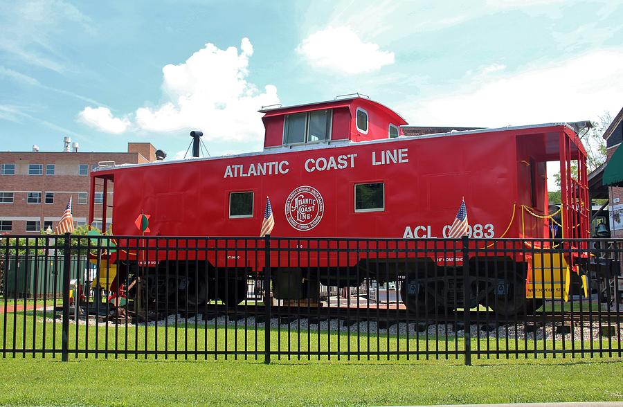 Transportation Photograph - Red Caboose On Display by Cynthia Guinn