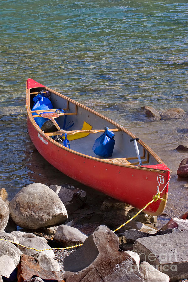 Red canoe Photograph by Louise Heusinkveld