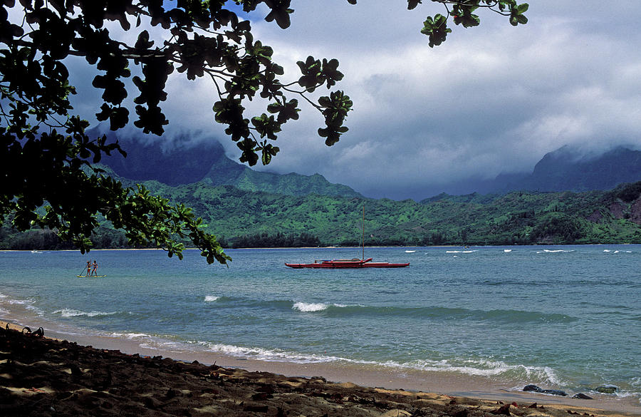 Red Canoe on Hanalei Bay Photograph by Kathy Yates