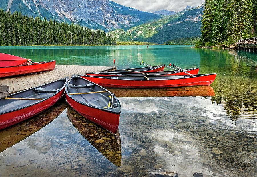Red Canoes Photograph by Maureen Fahey