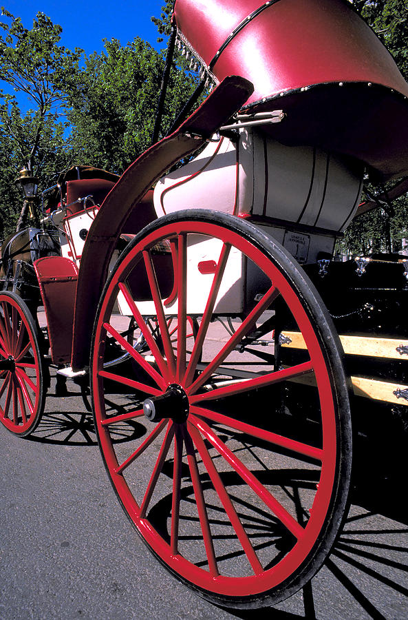 Red Carriage Wheel in Montreal Photograph by Carl Purcell | Fine Art