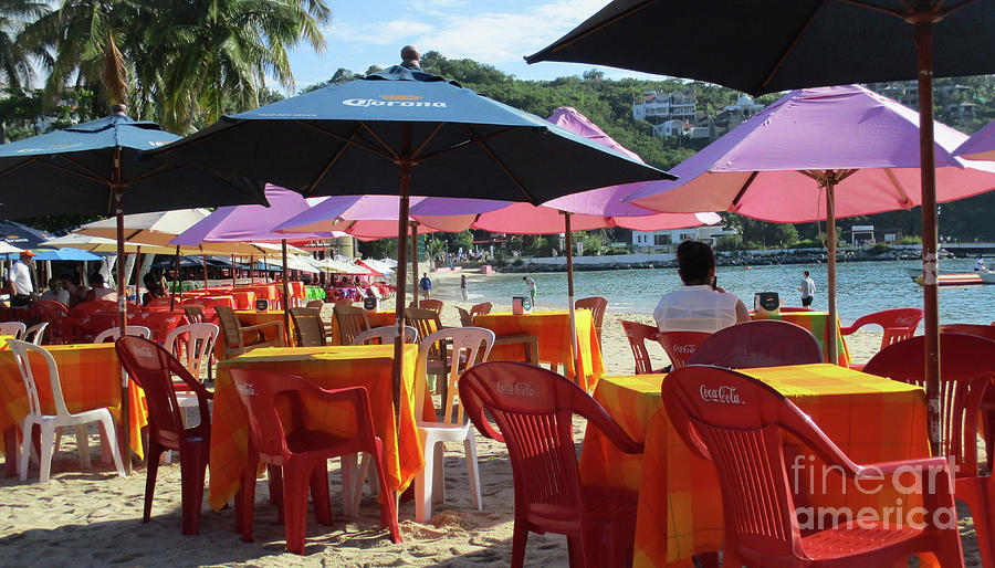 Red Chairs Pink Parasols Photograph by Randall Weidner