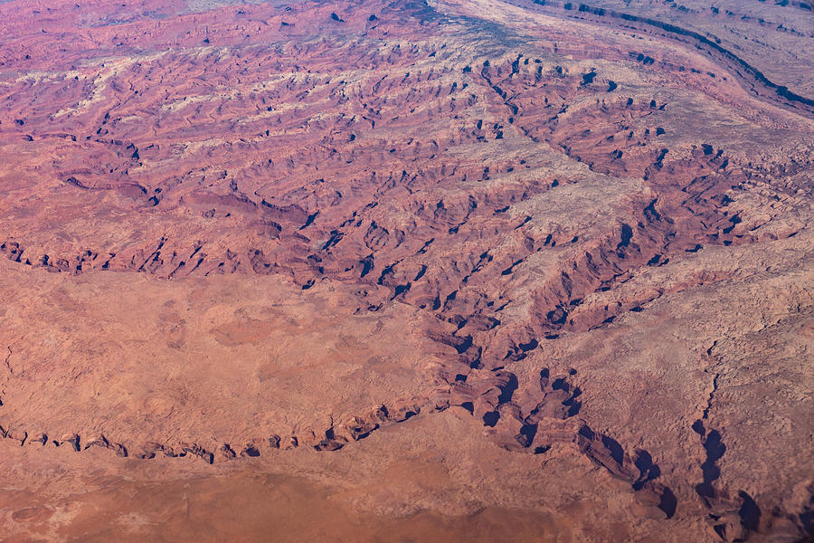 Red Earth - Flying Over Meandering Canyons Rverbeds and Mesas Photograph by Georgia Mizuleva