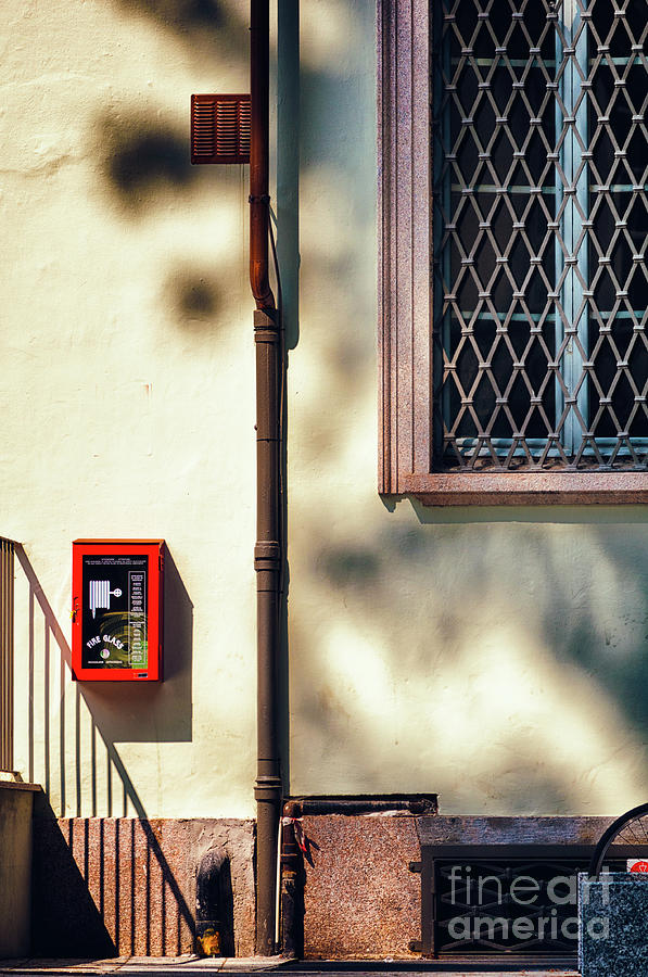 Red fire box with window, shadows and gutter Photograph by Silvia Ganora